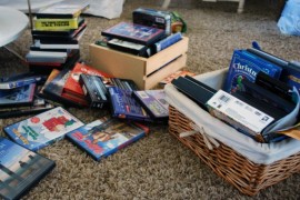 Use photo boxes to organize the media cabinet